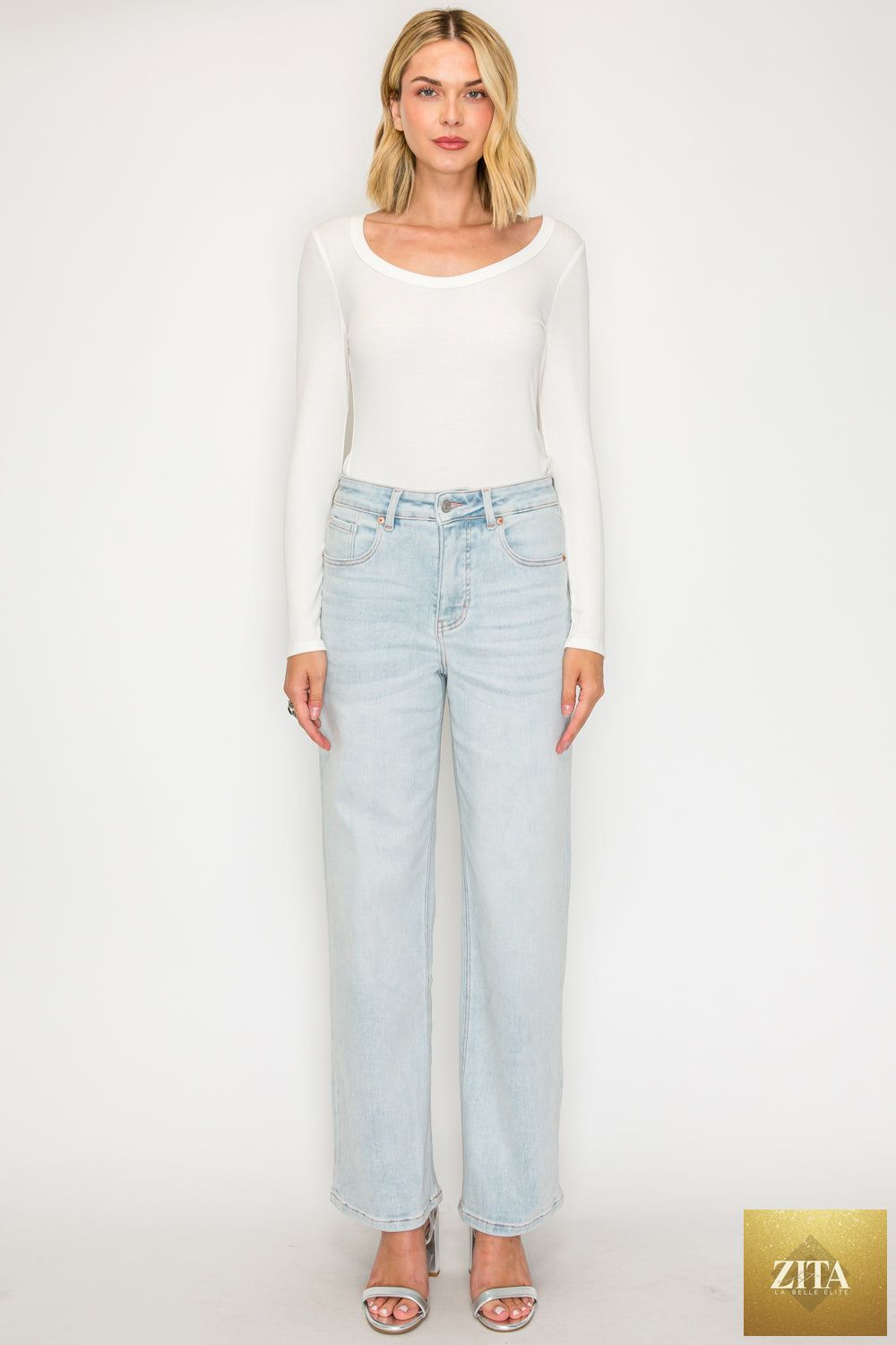 Pink high rise jeans with tummy control and straight leg fit by Artemis Vintage, made of soft modal fabric.