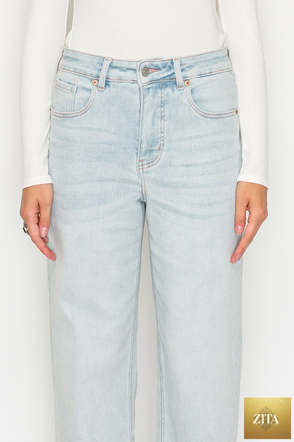 Pink high rise jeans with tummy control and straight leg fit by Artemis Vintage, made from soft modal fabric.