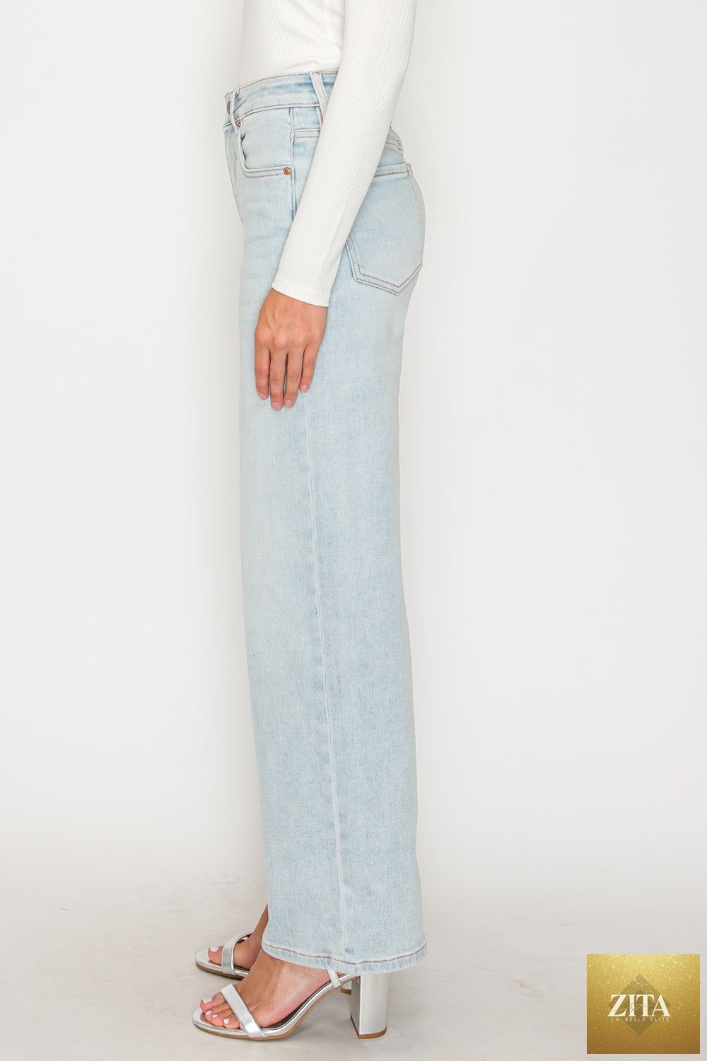 Pink high-rise jeans with tummy control and straight leg fit by Artemis Vintage, made from soft modal fabric.