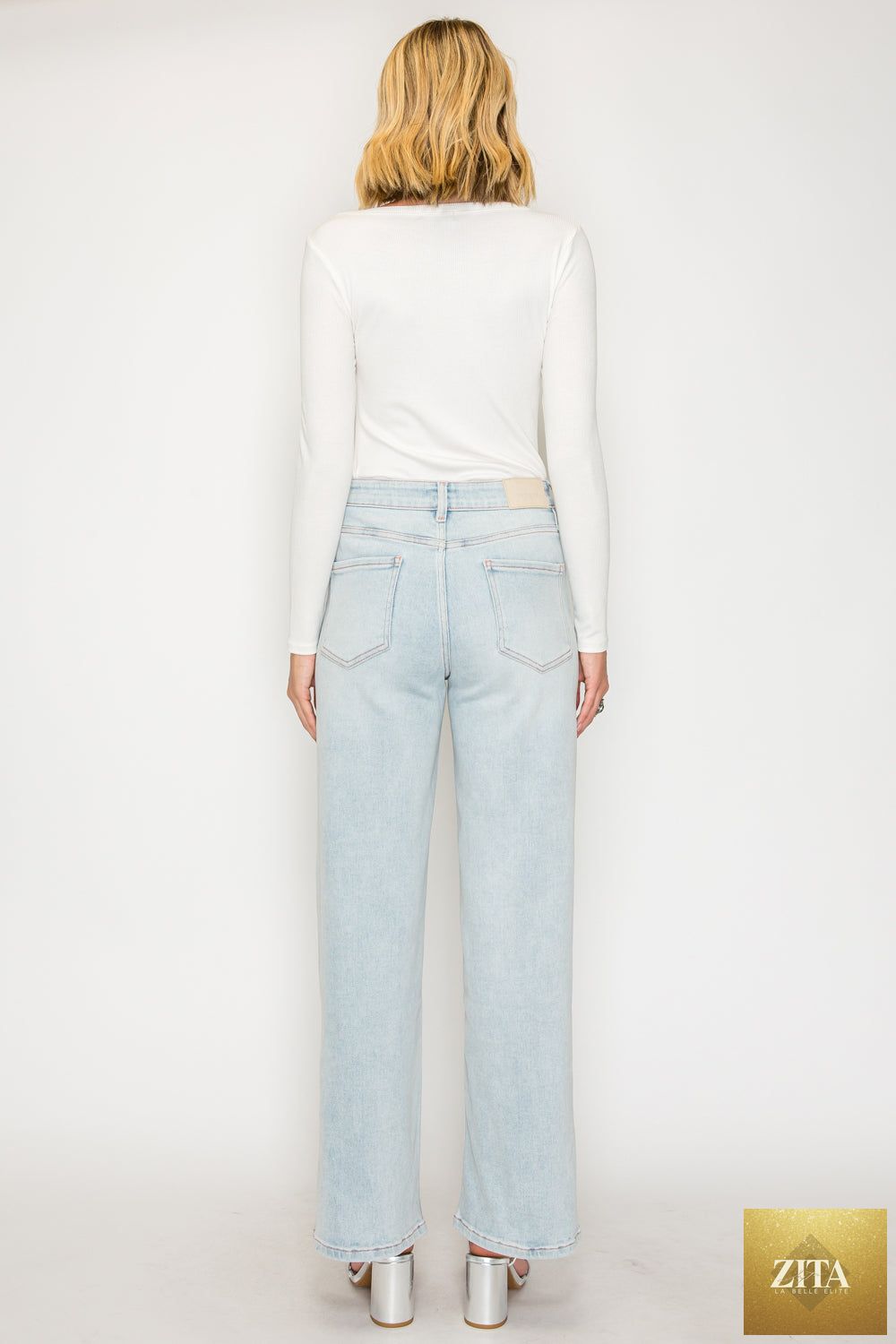 Pink high-rise jeans with tummy control and straight leg fit made from modal fabric by Artemis Vintage.