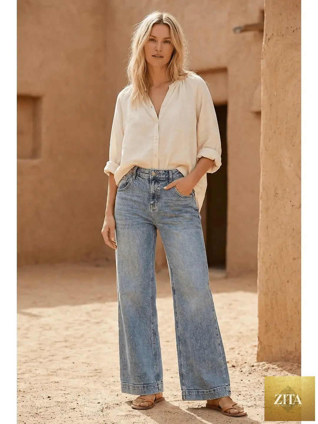 High-rise baggy wide jeans with adjustable waistband from Artemis Vintage, featuring a relaxed fit and vintage denim style.