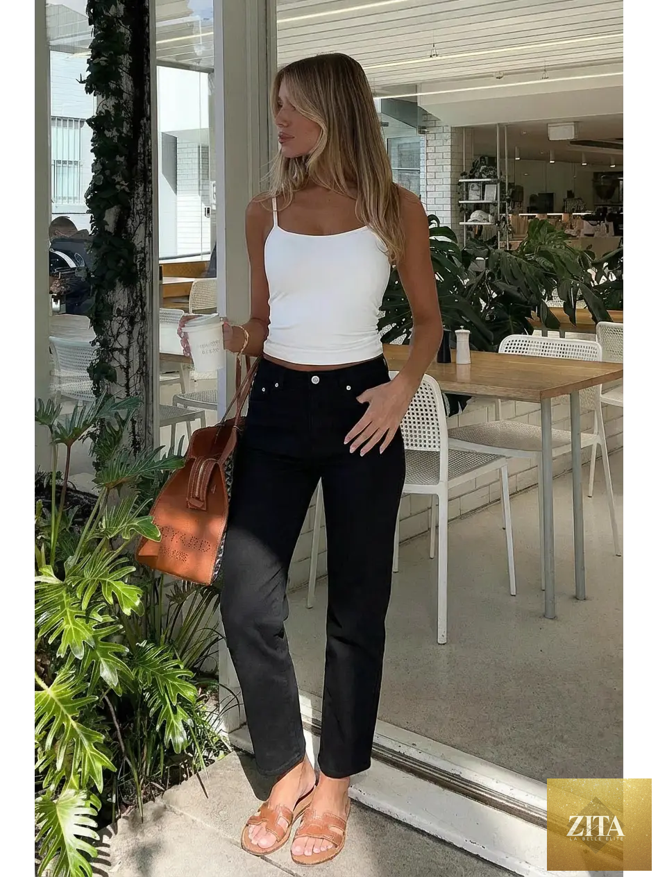 Artemis Vintage Alessandra Tummy Control High Rise Ankle Slim Straight Jeans displayed on a model, showing fit and style.