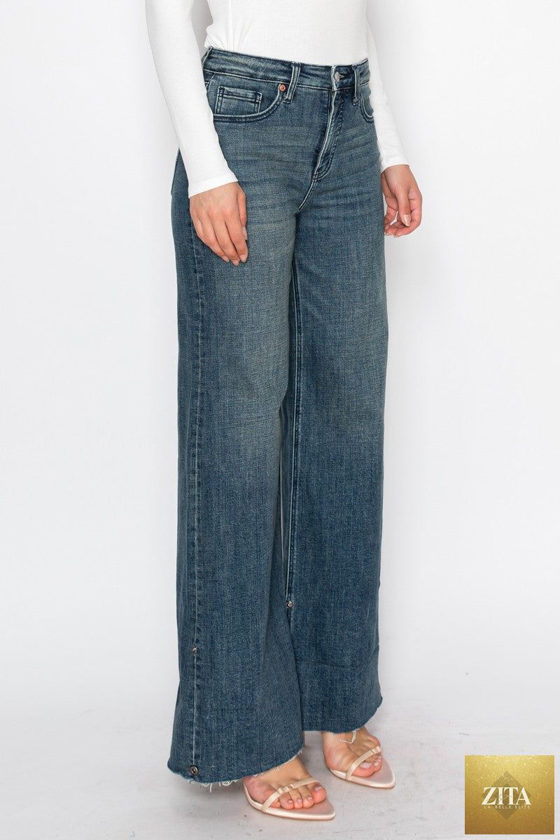Artemis Vintage Elise high-rise cuffed wide-leg jeans with tummy control, showcasing a light wash denim fit and cuffed hem style.
