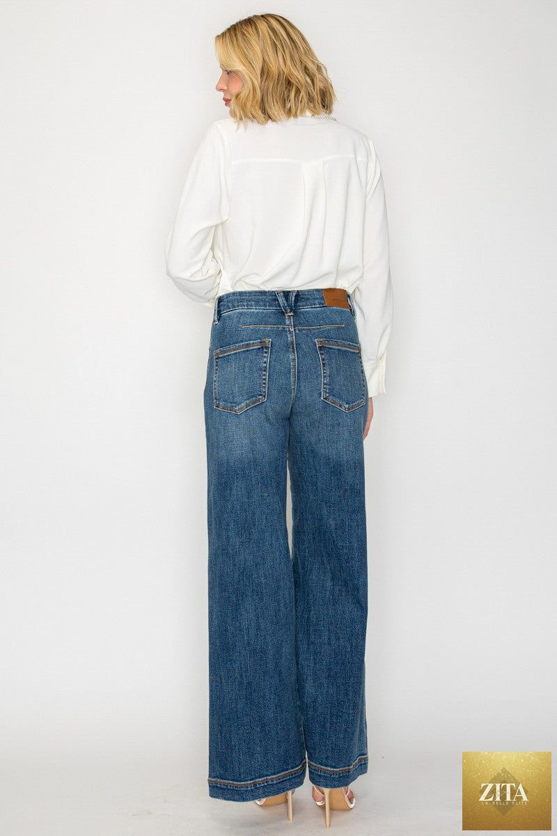 Relaxed high-rise palazzo jeans by Artemis Vintage, featuring a classic denim look with wide-leg style and relaxed fit.