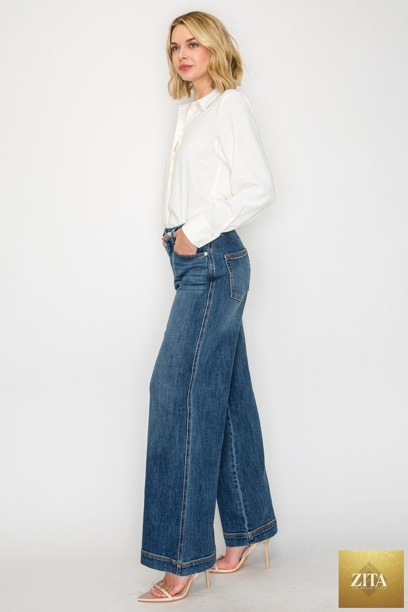 Relaxed high-rise palazzo jeans by Artemis Vintage, classic denim style with a loose fit and wide-leg silhouette.