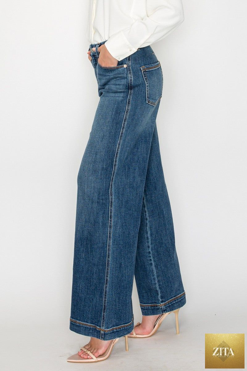 Relaxed high-rise palazzo jeans by Artemis Vintage featuring a classic denim look and wide-leg fit.