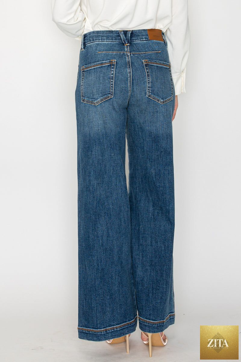 Relaxed high-rise palazzo jeans by Artemis Vintage, classic denim style with wide-leg fit and high waist.