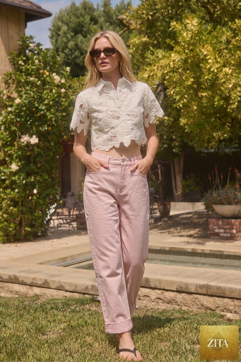 Pink high-rise barrel leg jeans from Artemis Vintage, featuring a relaxed fit and classic denim texture.