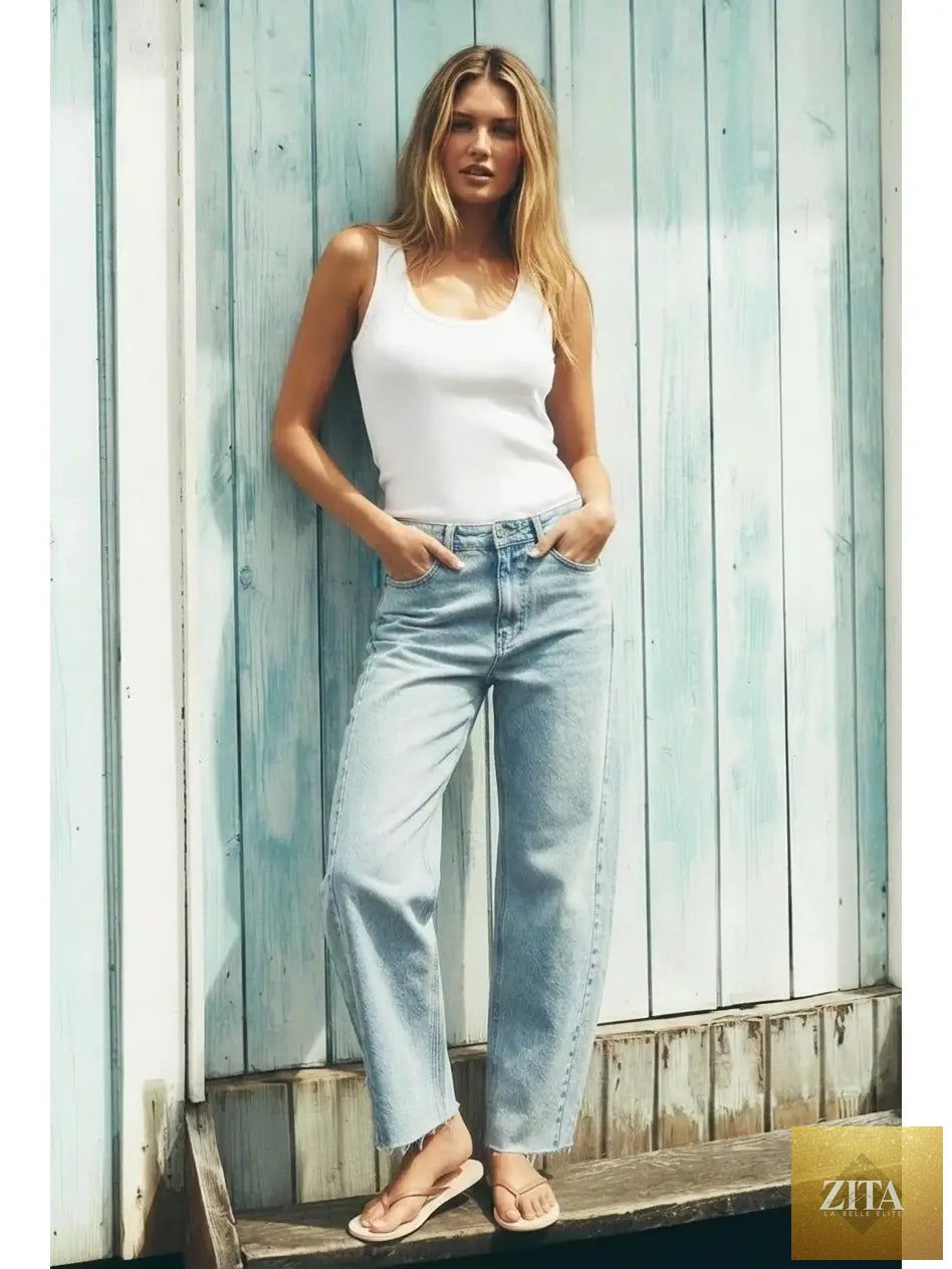 Blue Harlow high-waisted barrel jeans by Artemis Vintage, showcasing classic denim fit and vintage-inspired style.