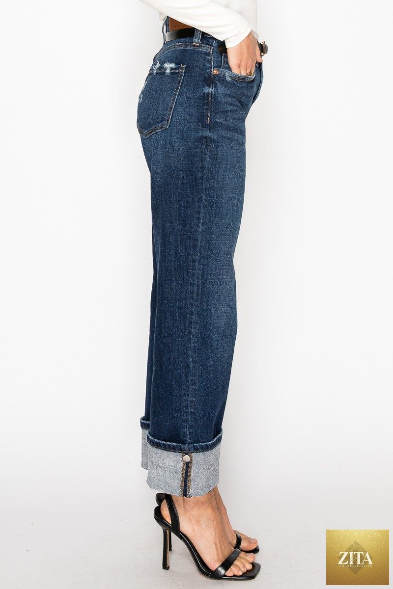Artemis Vintage Noelle Inseam Transform high-rise relaxed straight leg jeans displayed on a hanger with a light background.