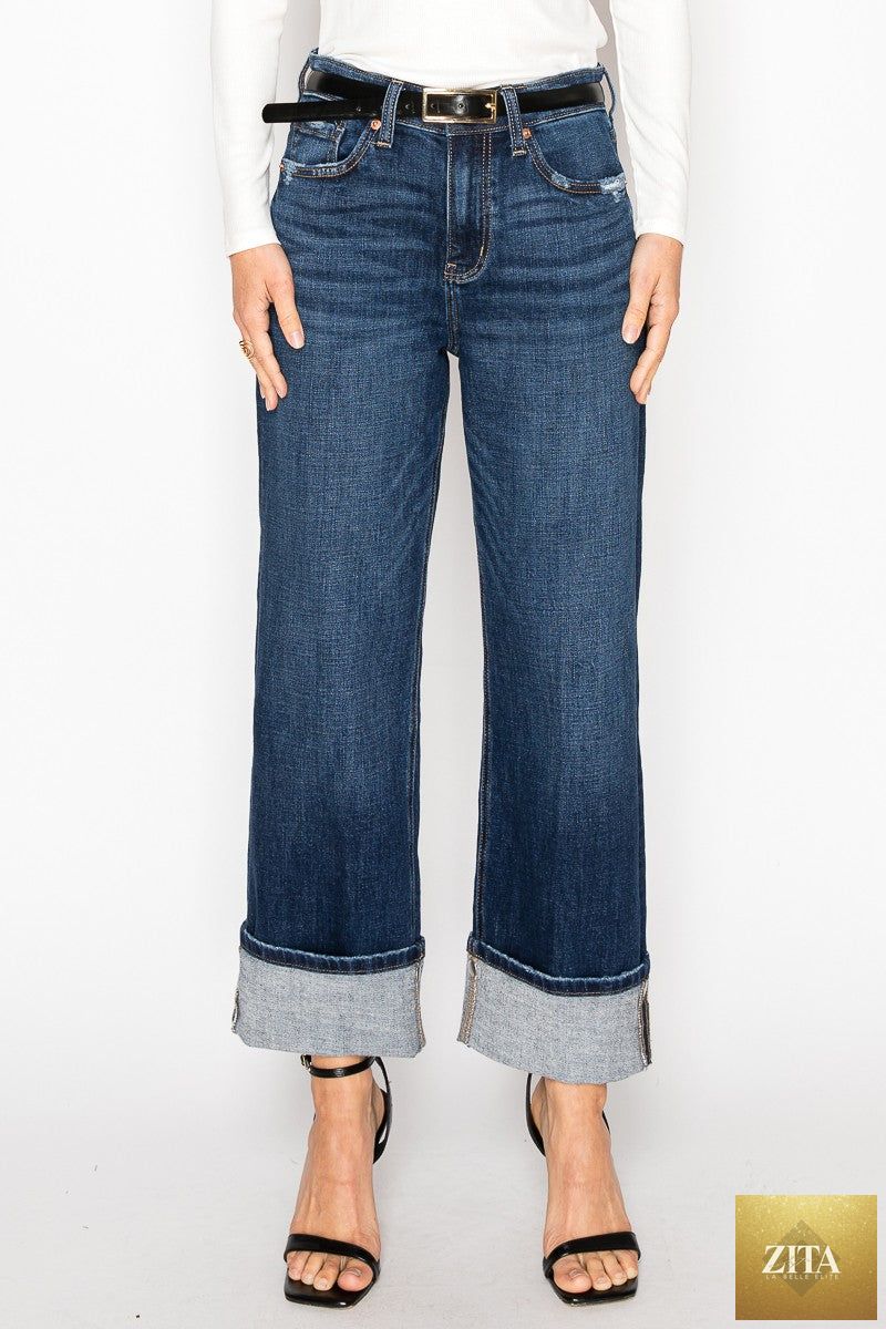 Artemis Vintage Noelle Inseam Transform high-rise relaxed straight-leg jeans displayed on a hanger with a light background.