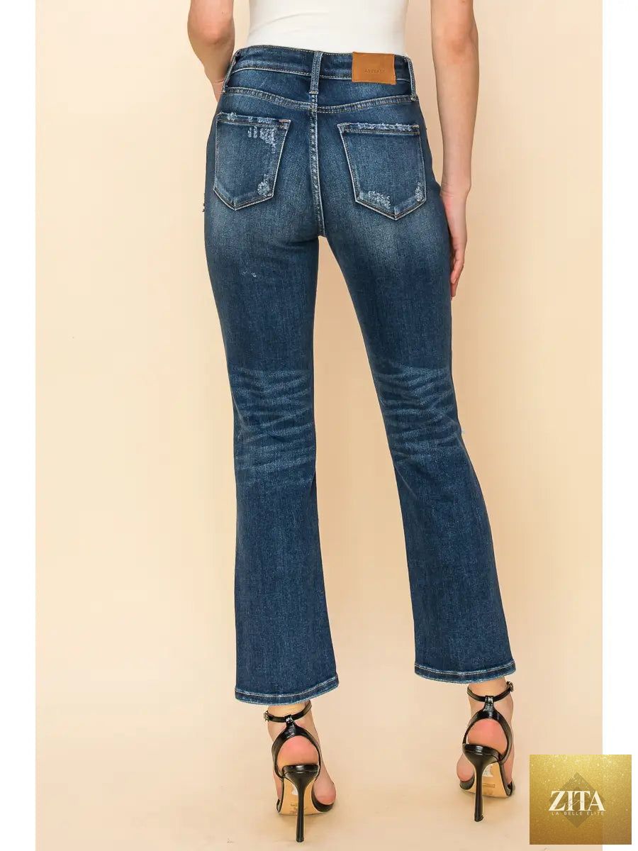 Artemis Vintage Ariel high-rise stretch distressed straight jeans, blue denim with rips and a fitted waist.