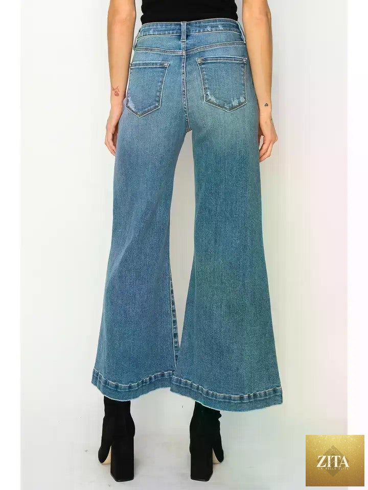 Noa high-rise crop palazzo jeans by Artemis Vintage, featuring a relaxed fit and classic denim style in a light wash.