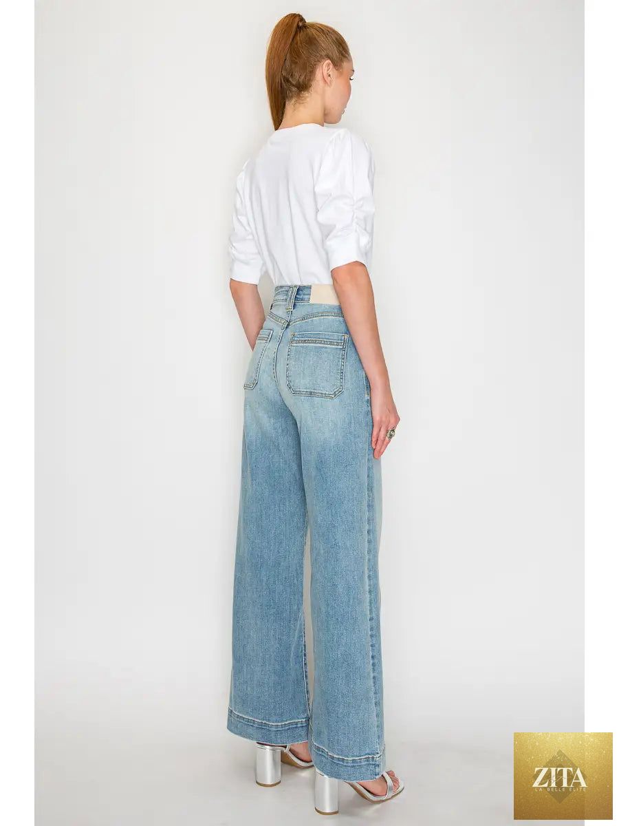 Artemis Vintage high-rise jeans with tummy control and wide-leg fit, showcasing a classic denim design with a relaxed silhouette.