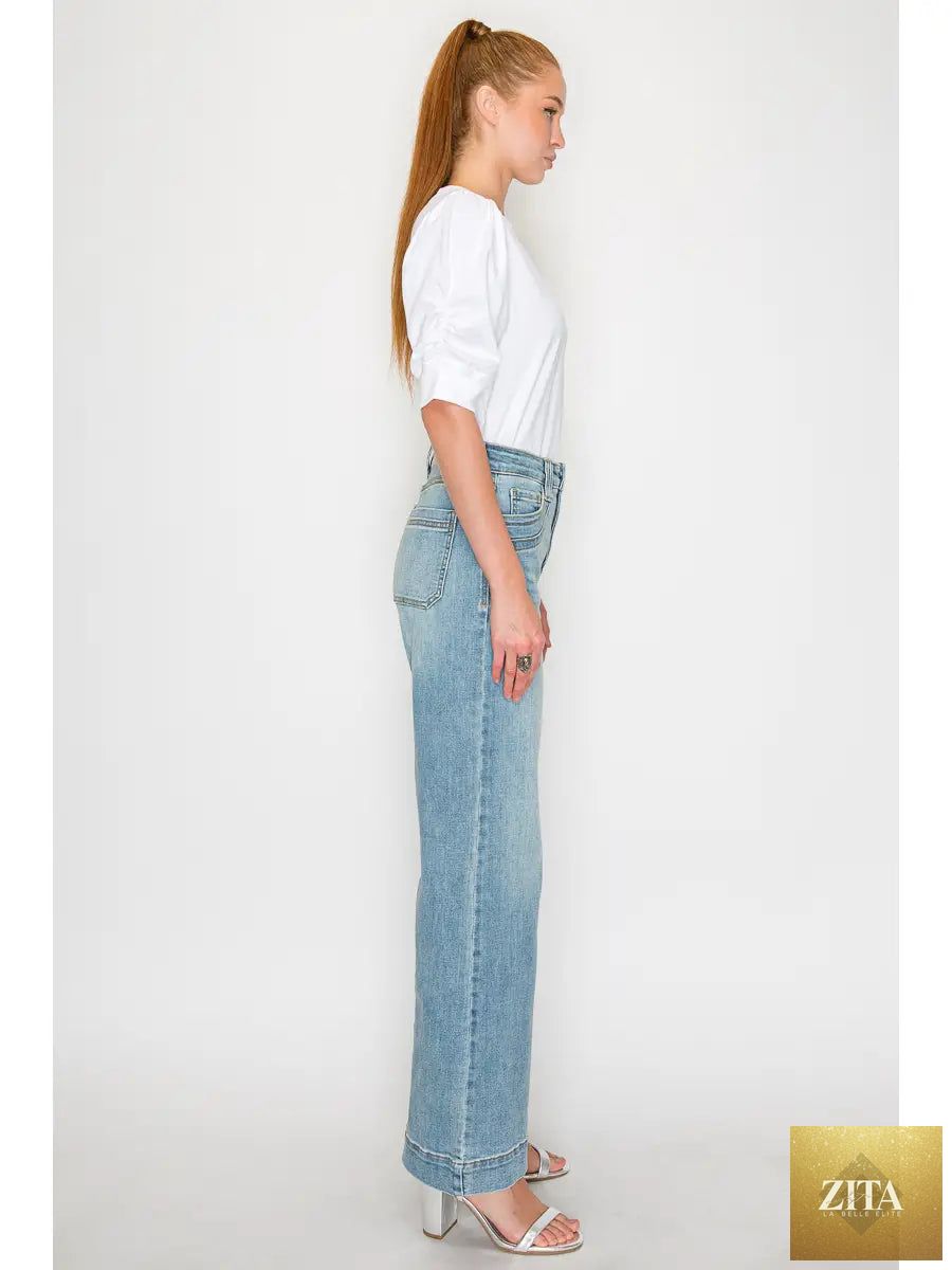 High-rise Artemis Vintage jeans with tummy control and wide-leg fit, featuring classic denim wash and stylish stitching details.
