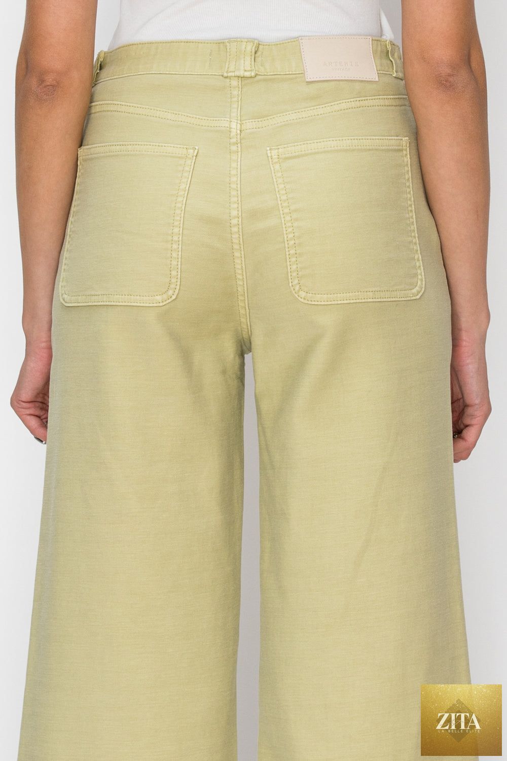 High rise sage green wide leg jeans from Artemis Vintage featuring a relaxed fit and classic denim texture.