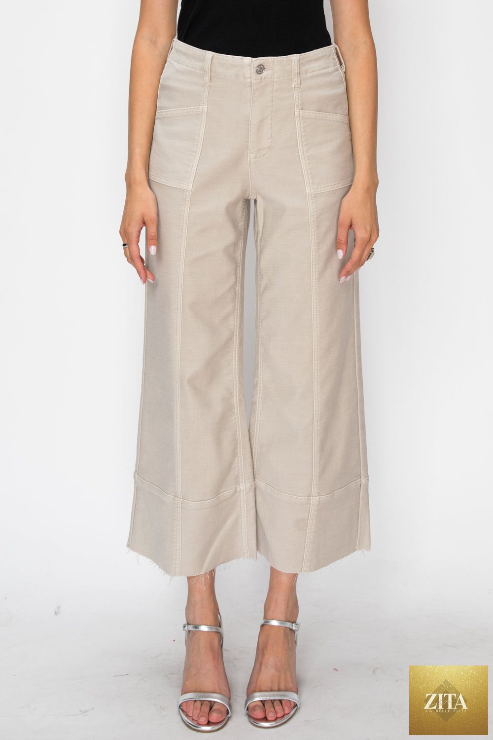 High rise slim crop palazzo jeans by Artemis Vintage showing the fitted waist and wide cropped legs in denim.