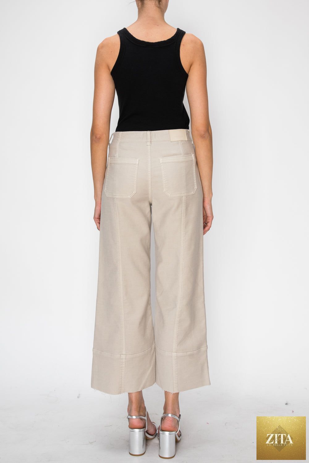 High rise slim crop palazzo jeans by Artemis Vintage, showcasing the stylish fit and cropped length in a denim fabric.