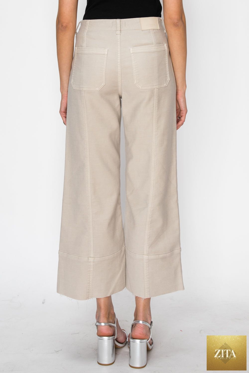 High rise slim crop palazzo jeans by Artemis Vintage, showcasing their stylish fit and denim texture.
