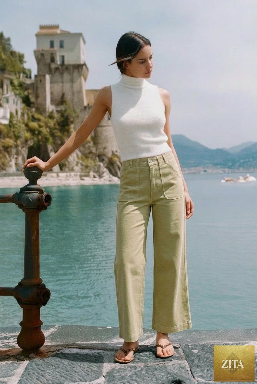 High rise wide leg sage jeans by Artemis Vintage, featuring a relaxed fit and classic denim texture.
