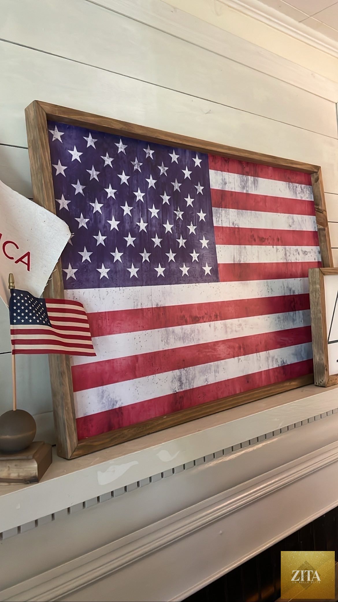 Framed American flag art by Zita La Belle Elite, featuring patriotic artwork in a stylish black frame.