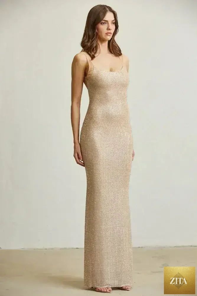 Femstylo Crystal Mirage Gown dress for women featuring a shimmering, elegant design with intricate crystal detailing.