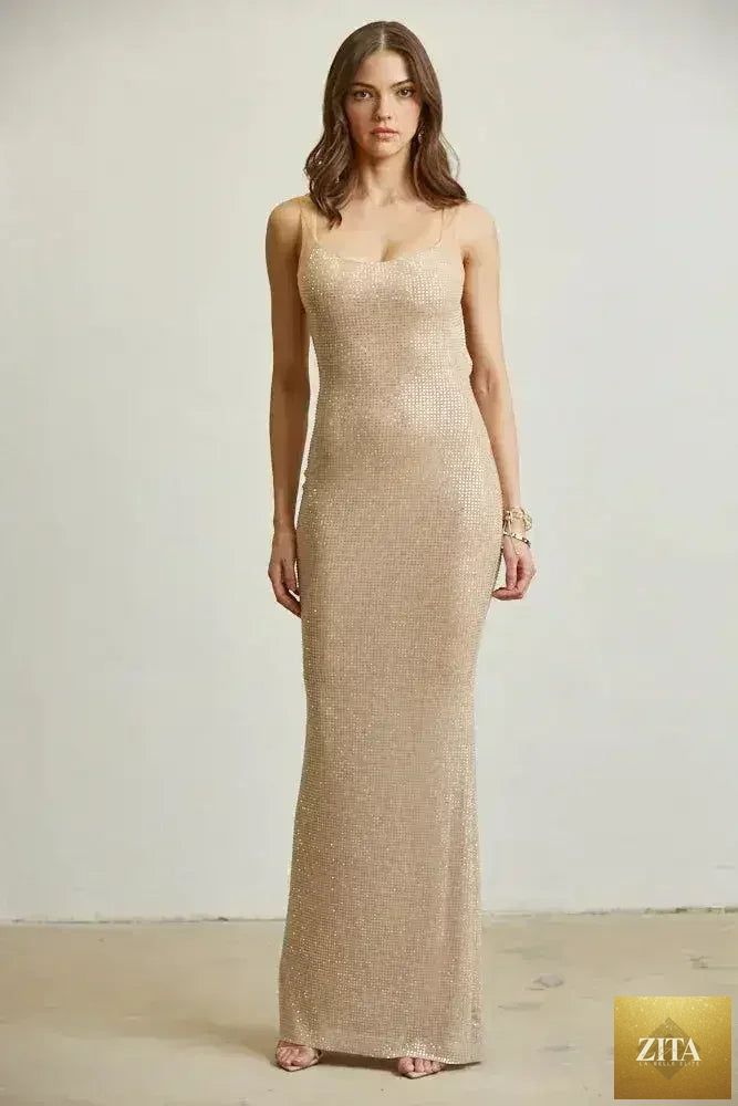 Elegant Crystal Mirage Gown dress for women by Femstylo, featuring intricate crystal embellishments and flowing fabric.