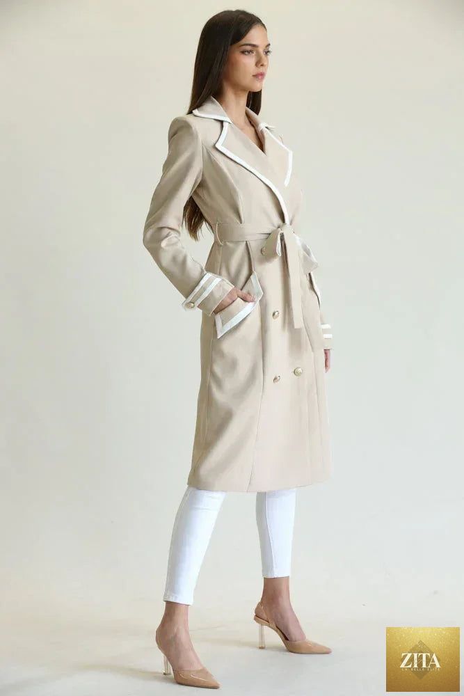 Elegant long belted coat for women by Zita La Belle Elite, showing the stylish coat with belt and tailored fit.