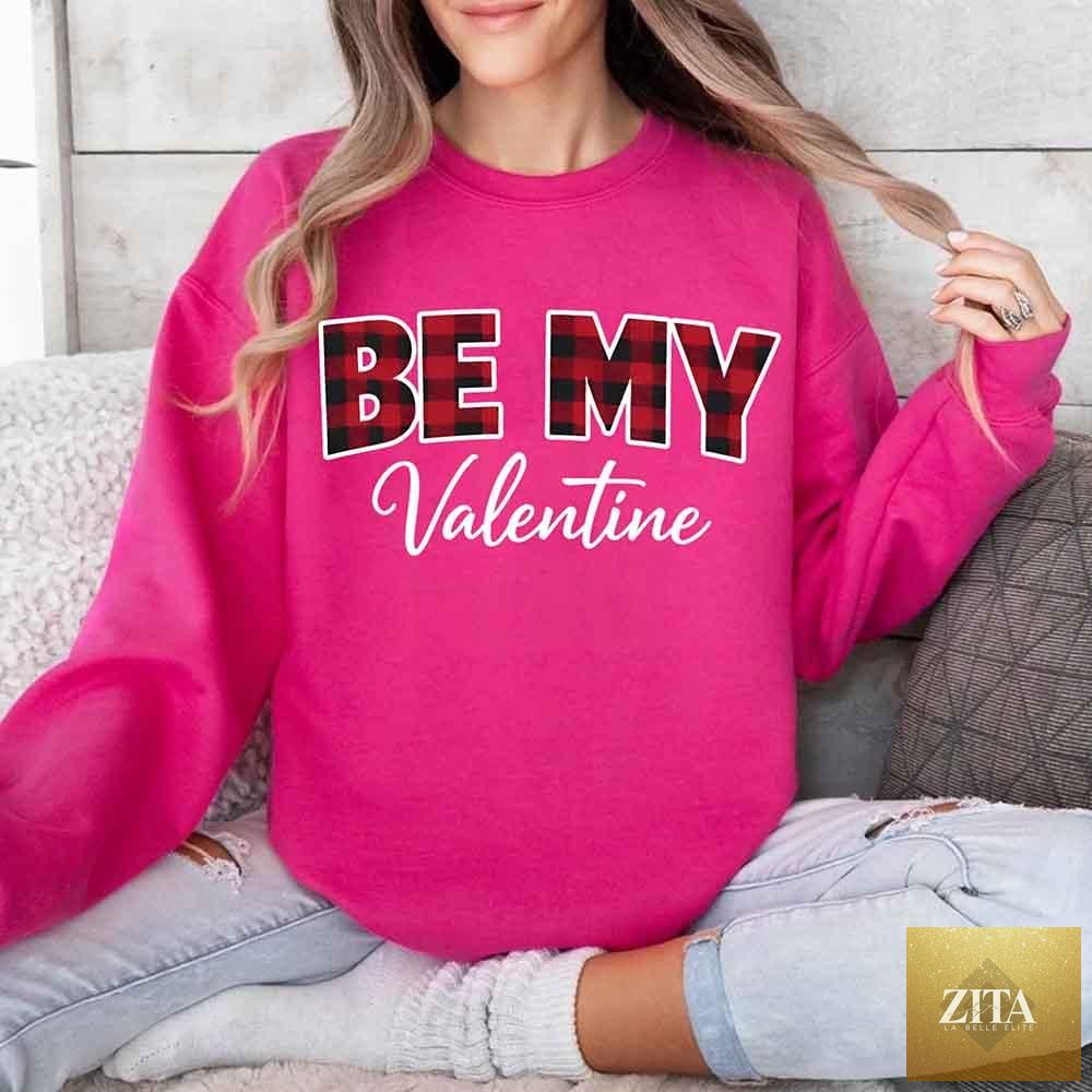 Red and black buffalo plaid crewneck sweatshirt with "Be My Valentine" text, casual Valentine's Day sweatshirt by Adorb Custom Tees.