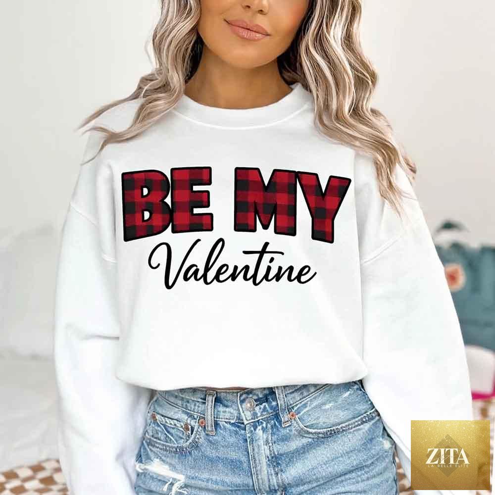 Red and black buffalo plaid crewneck sweatshirt by Adorb Custom Tees with "Be My Valentine" print for Valentine's Day.