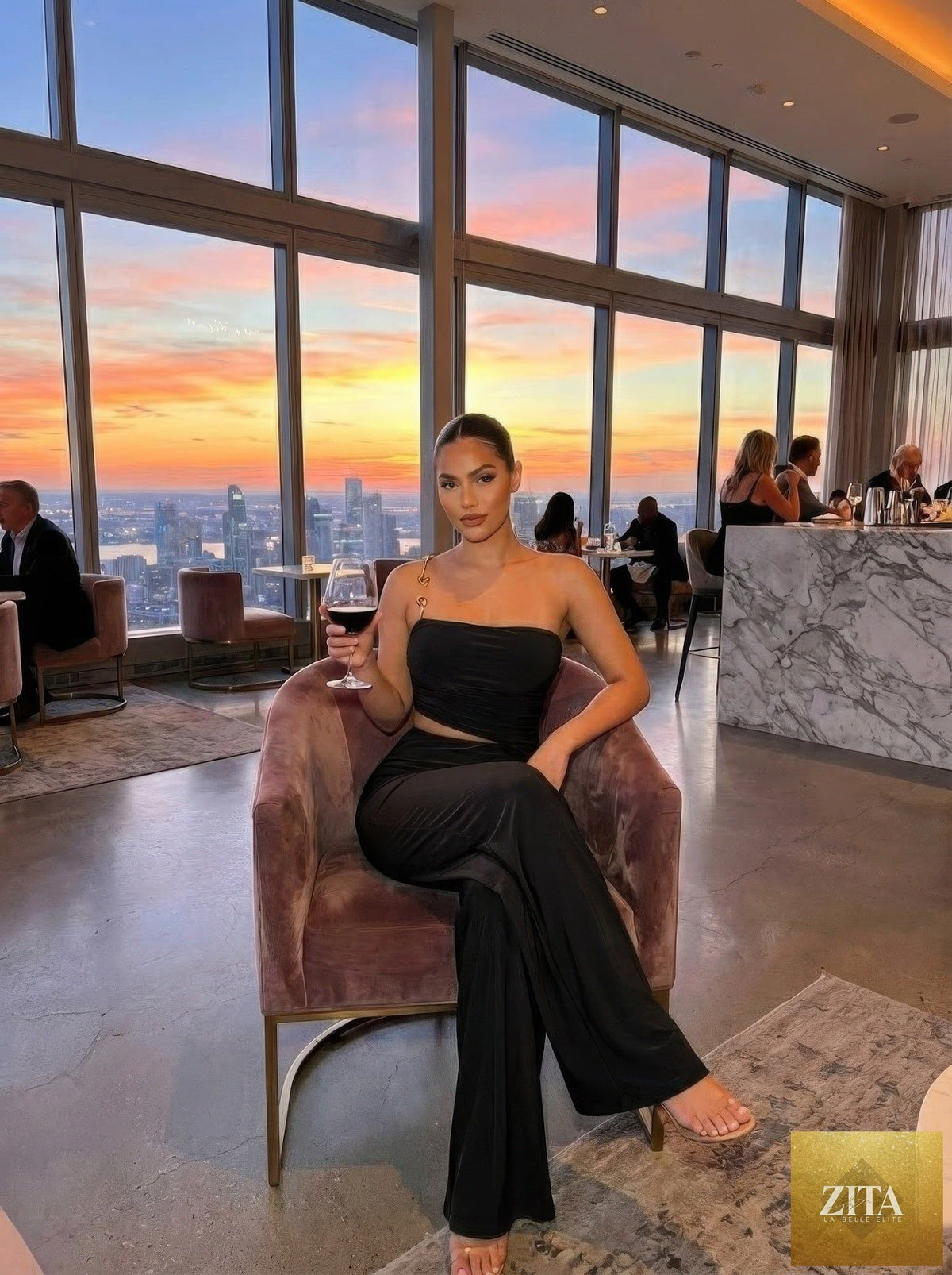 Ruched bandeau-style modern jumpsuit by Tigbul's Variety Fashion Shop, featuring a sleek, fitted design and stylish silhouette.