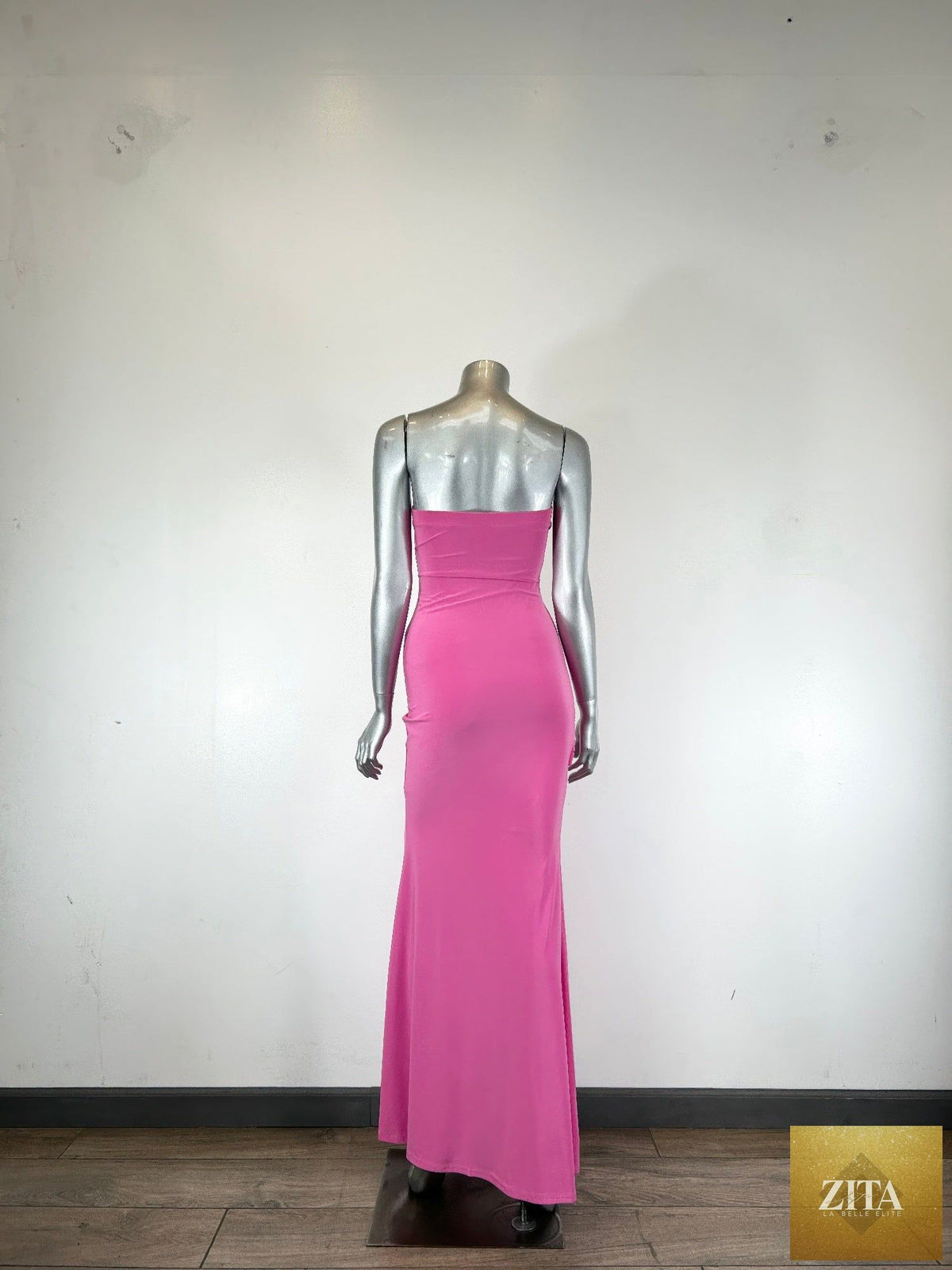 Elegant draped Grecian-style maxi dress by Tigbul's Variety Fashion Shop, flowing fabric and classic silhouette.