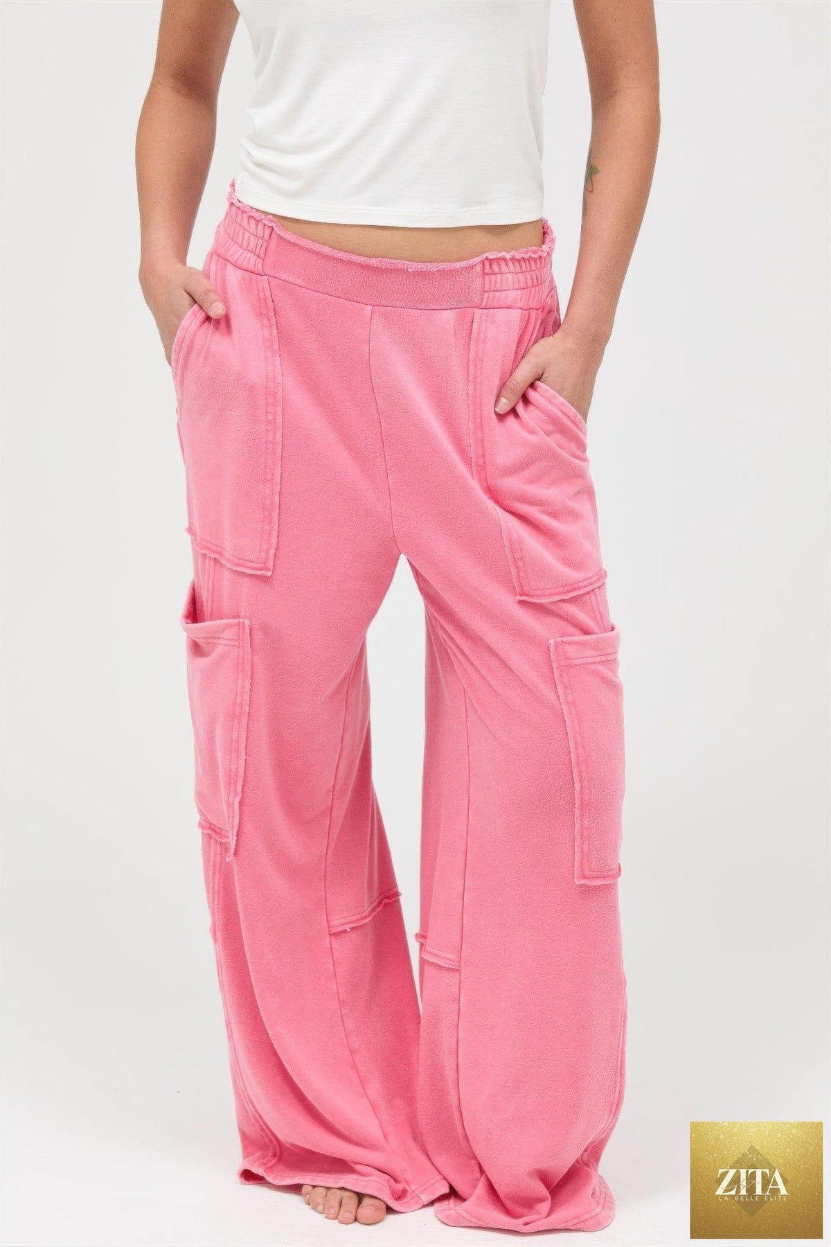 Mineral wash wide leg cargo pants in neutral tones, featuring multiple pockets and relaxed fit, by Tigbul's Variety Fashion Shop.