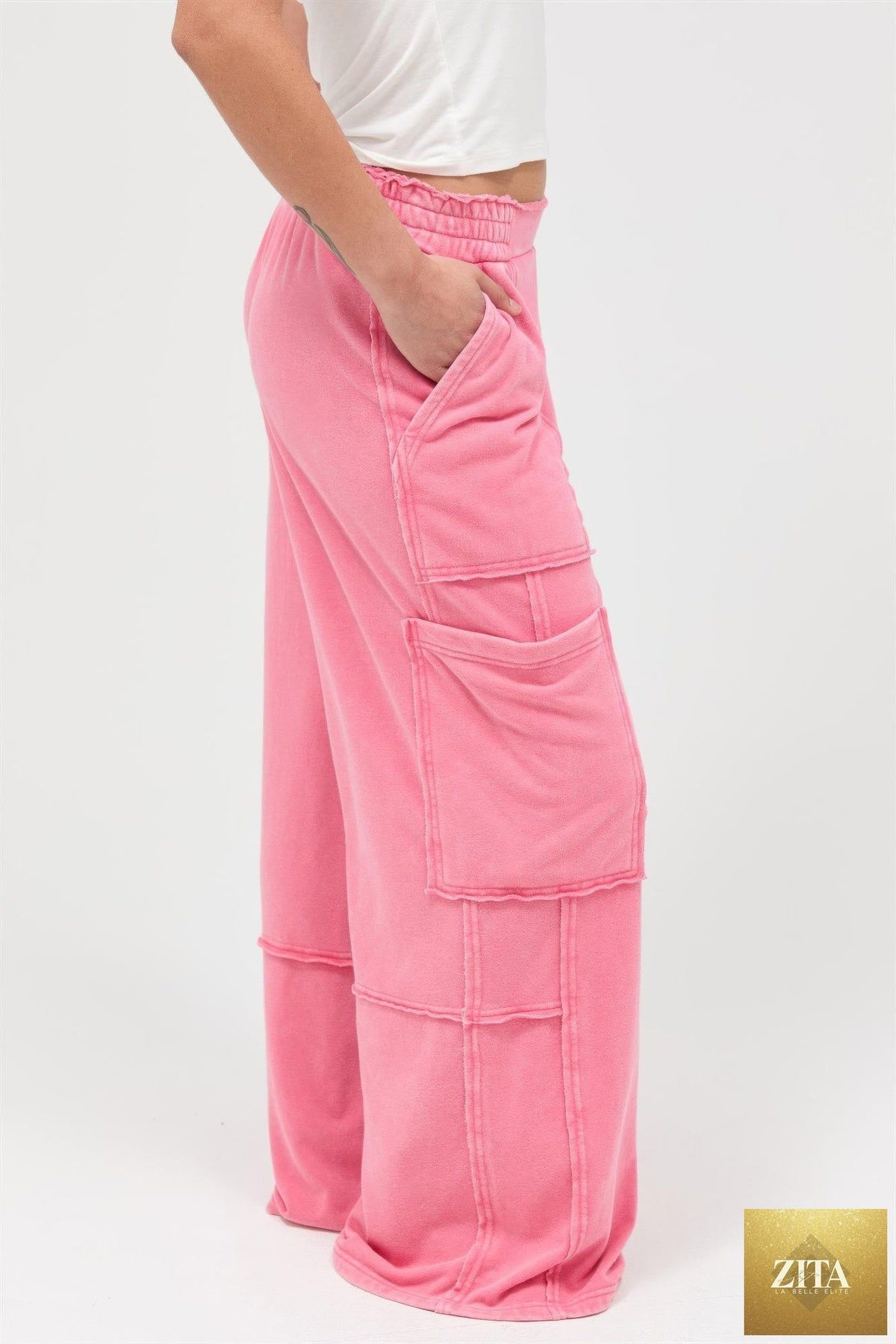Mineral wash wide-leg cargo pants from Tigbul's Variety Fashion Shop, featuring multiple pockets and relaxed fit.