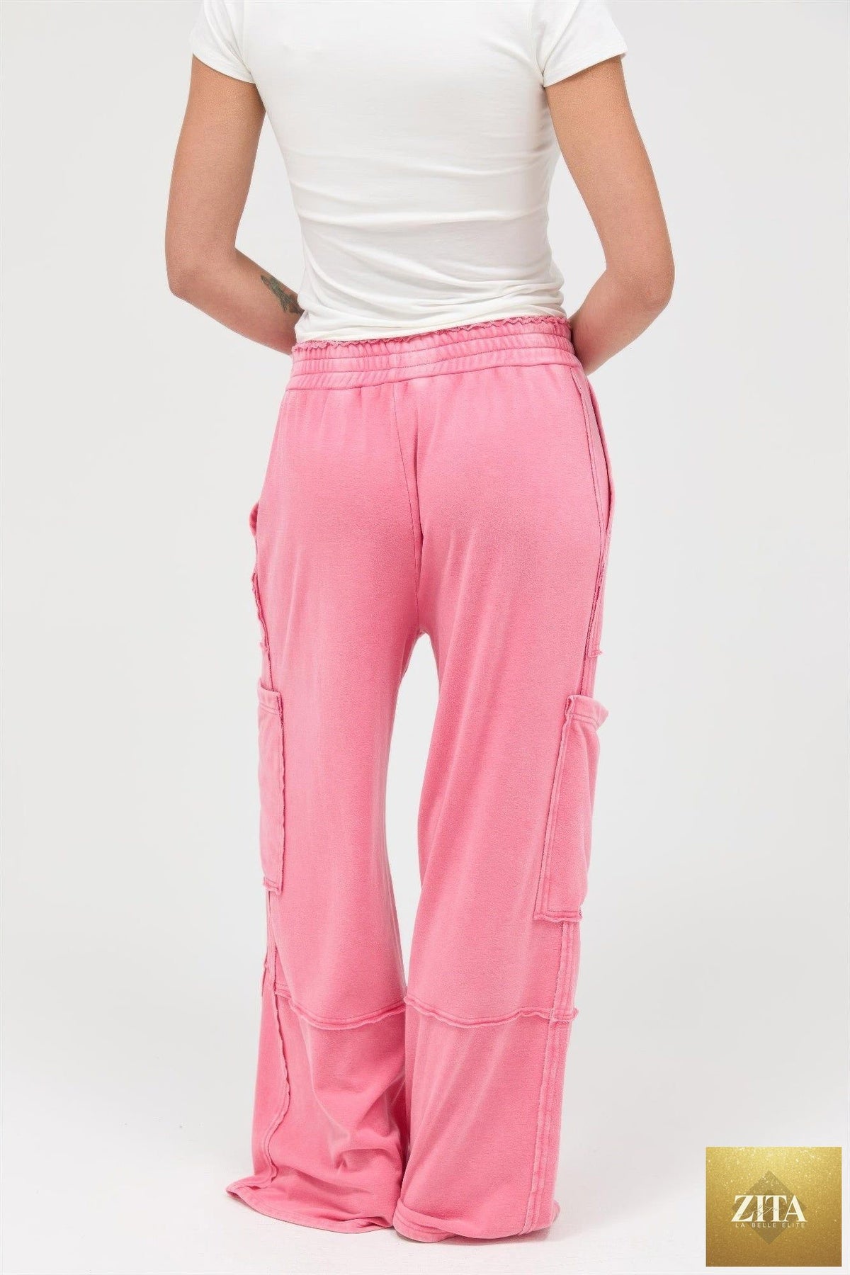 Mineral wash wide leg cargo pants in beige with multiple pockets, made by Tigbul's Variety Fashion Shop.