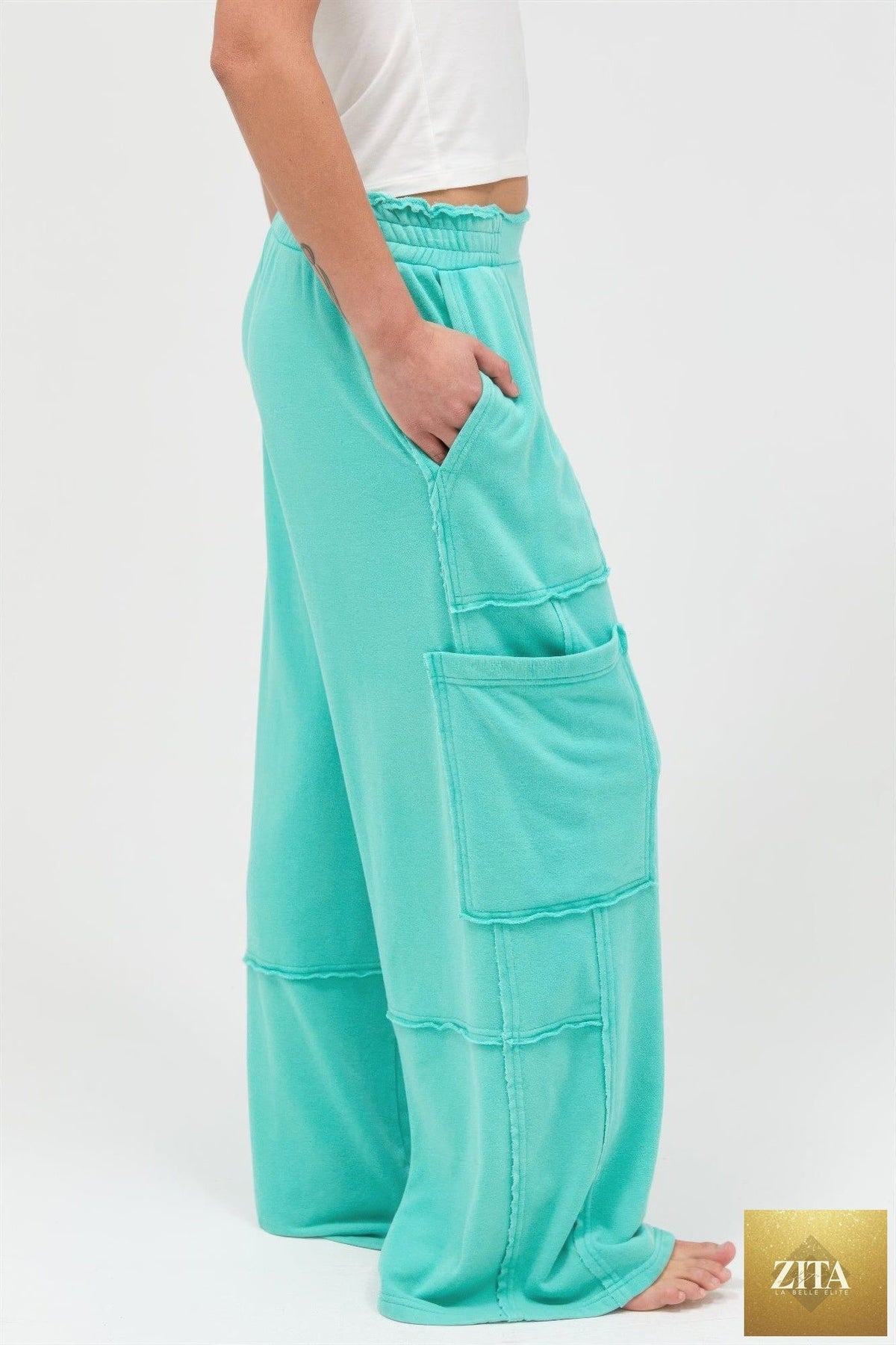 Mineral Wash Wide Leg Cargo Pants from Tigbul's Variety Fashion Shop, featuring a relaxed fit and multiple utility pockets.