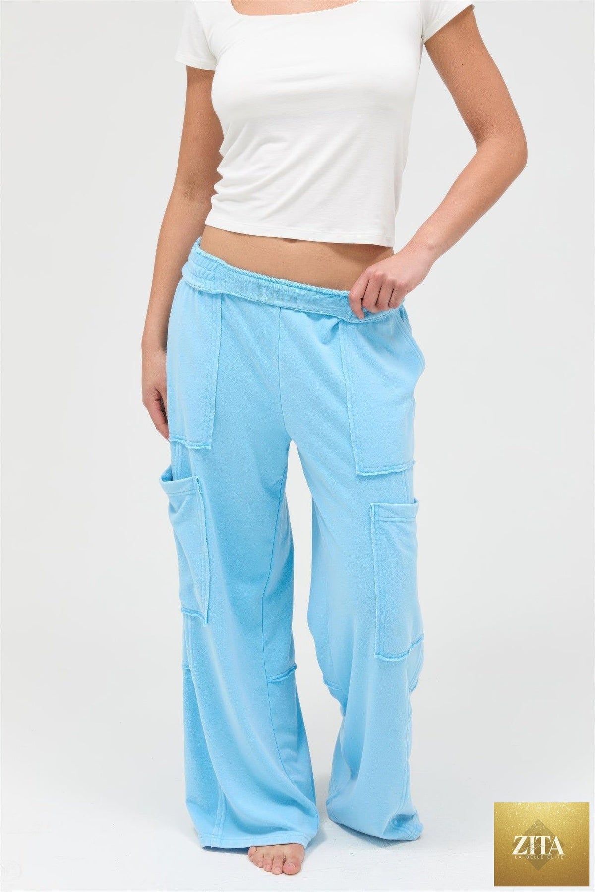 Mineral wash wide leg cargo pants in beige with multiple pockets, casual streetwear style from Tigbul's Variety Fashion Shop.