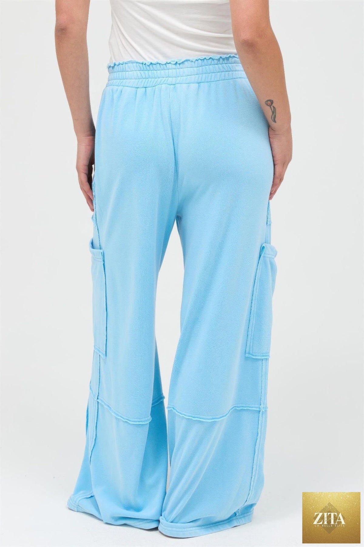 Mineral Wash Wide Leg Cargo Pants by Tigbul's Variety Fashion Shop, featuring relaxed fit and multiple cargo pockets.
