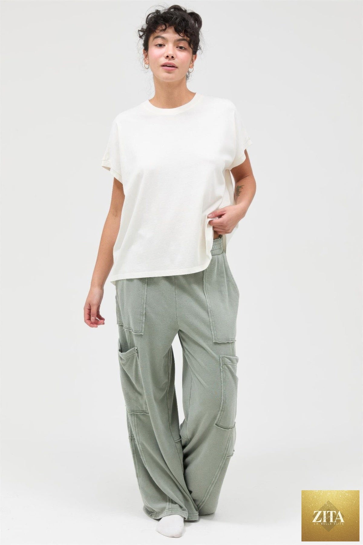 Mineral wash wide-leg cargo pants in olive green with multiple pockets, stylish and comfortable, from Tigbul's Variety Fashion Shop.
