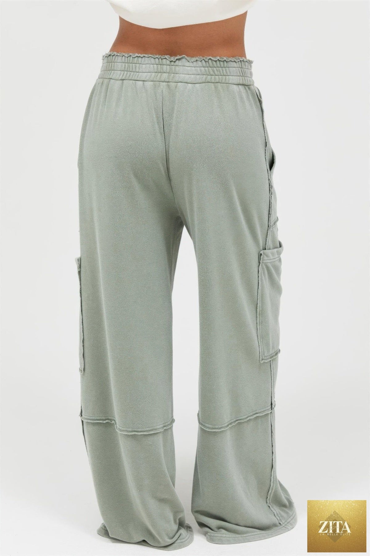 Mineral wash wide leg cargo pants in beige with multiple pockets, made by Tigbul's Variety Fashion Shop.