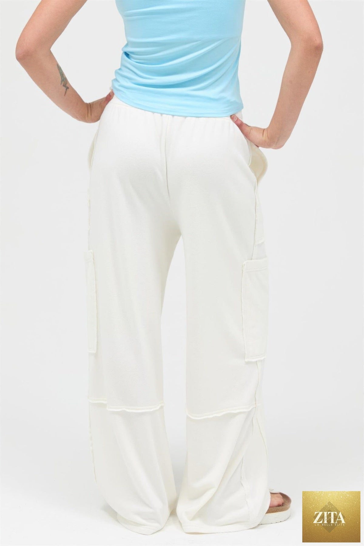 Mineral Wash Wide Leg Cargo Pants by Tigbul's Variety Fashion Shop, featuring relaxed fit and multiple cargo pockets.
