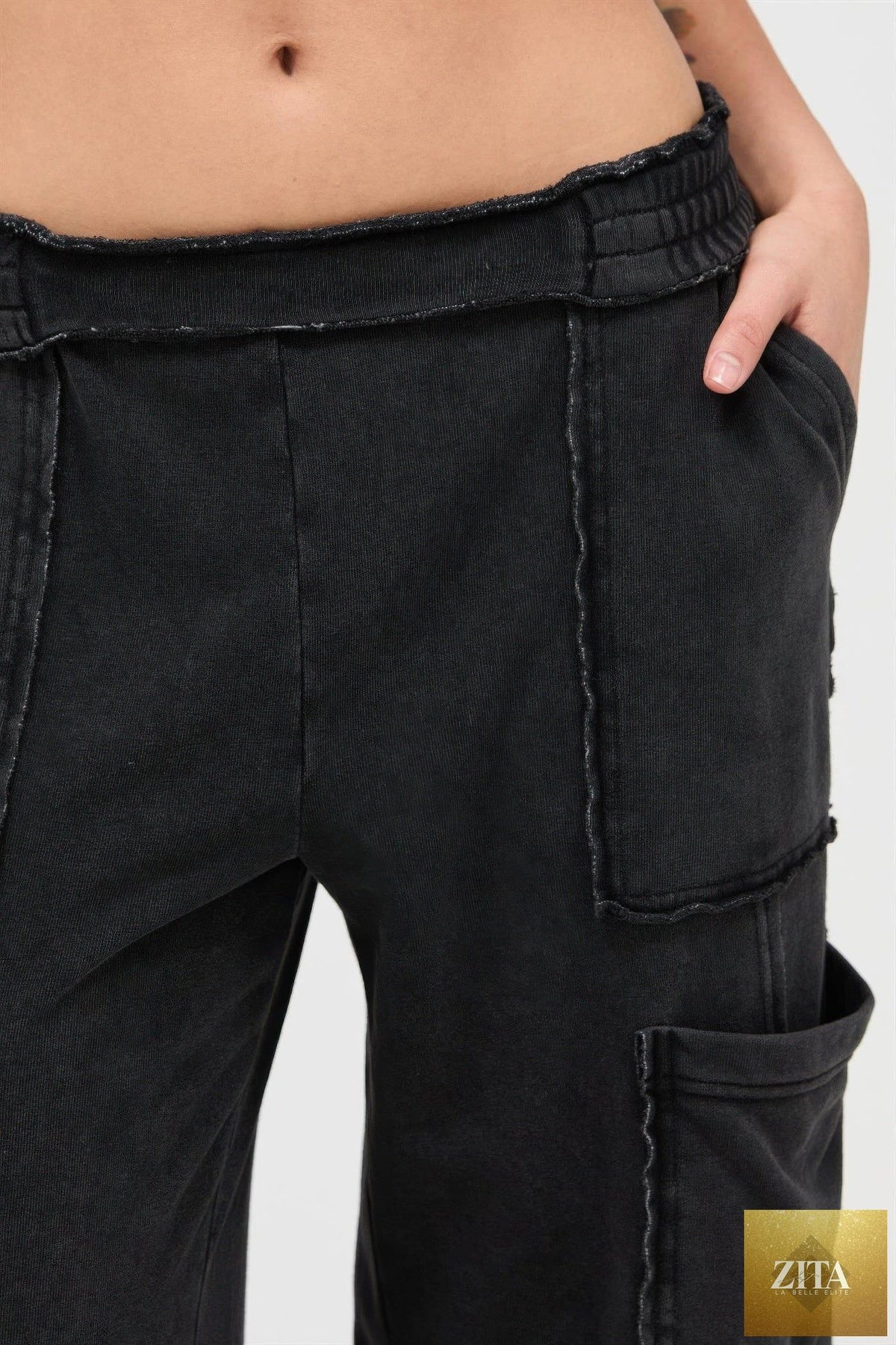 Mineral Wash Wide Leg Cargo Pants by Tigbul's Variety Fashion Shop, featuring relaxed fit and multiple cargo pockets.