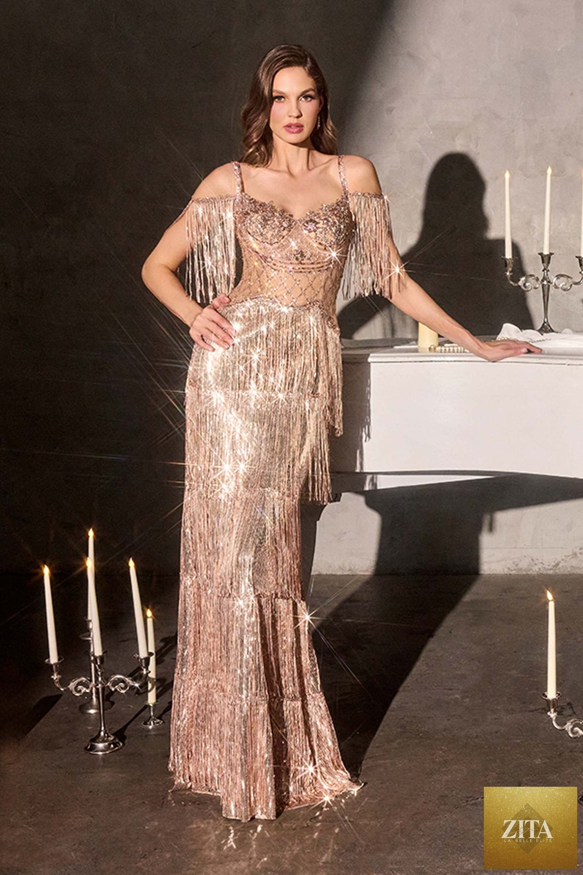 Rose gold Ladivine off-shoulder evening gown with draped fringe sleeves and sequin embellishments, front view.