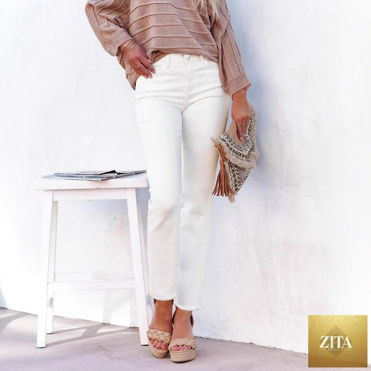 Women's straight leg ankle-length raw hem denim pants by FitiqueFit, high-waist casual jeans shown on model.