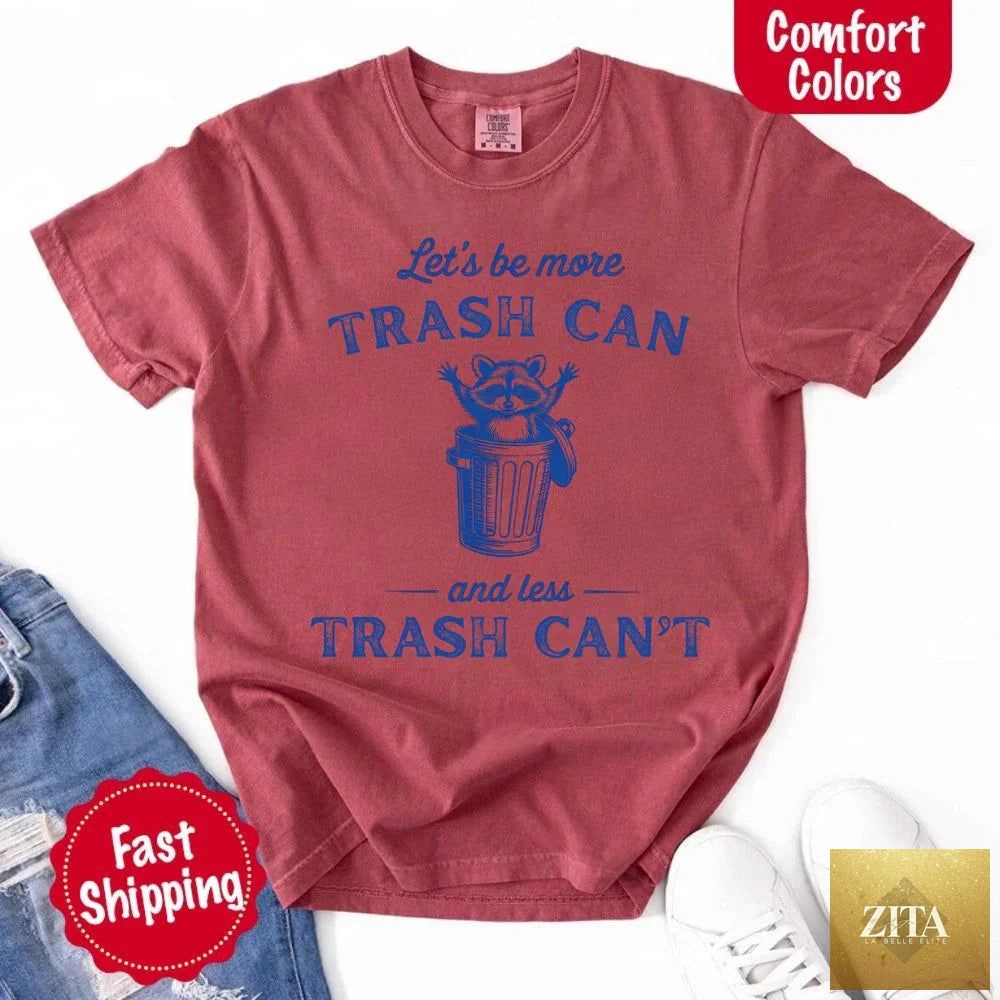 Comfort Colors T-shirt featuring a humorous raccoon trash can design from Adorb Custom Tees, casual and fun graphic tee.