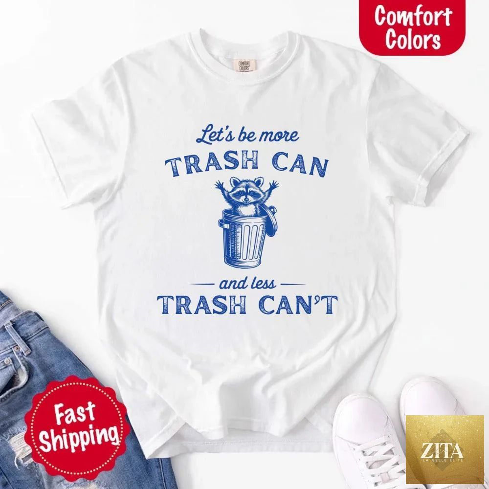 Comfort Colors Let's Be More Trash Can Raccoon funny T-shirt featuring a playful raccoon graphic on a casual cotton tee.