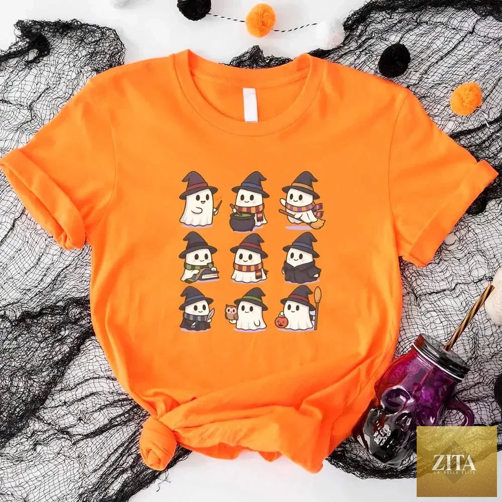Cute witch and ghost Halloween t-shirt featuring kawaii spooky design from Adorb Custom Tees, perfect for Halloween costumes or festive wear.