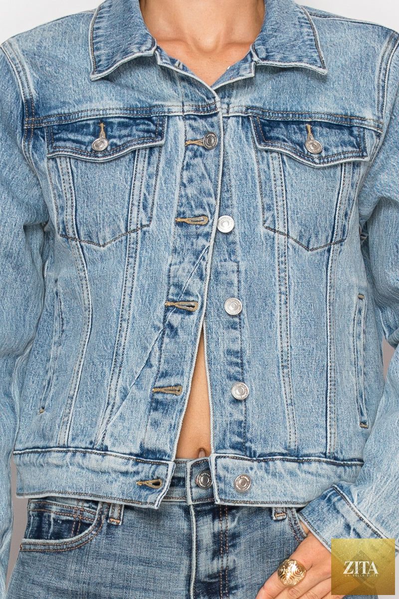 Artemis Vintage Michelle Classic Denim Jacket displayed on a hanger, featuring a stylish blue denim design with button closures.