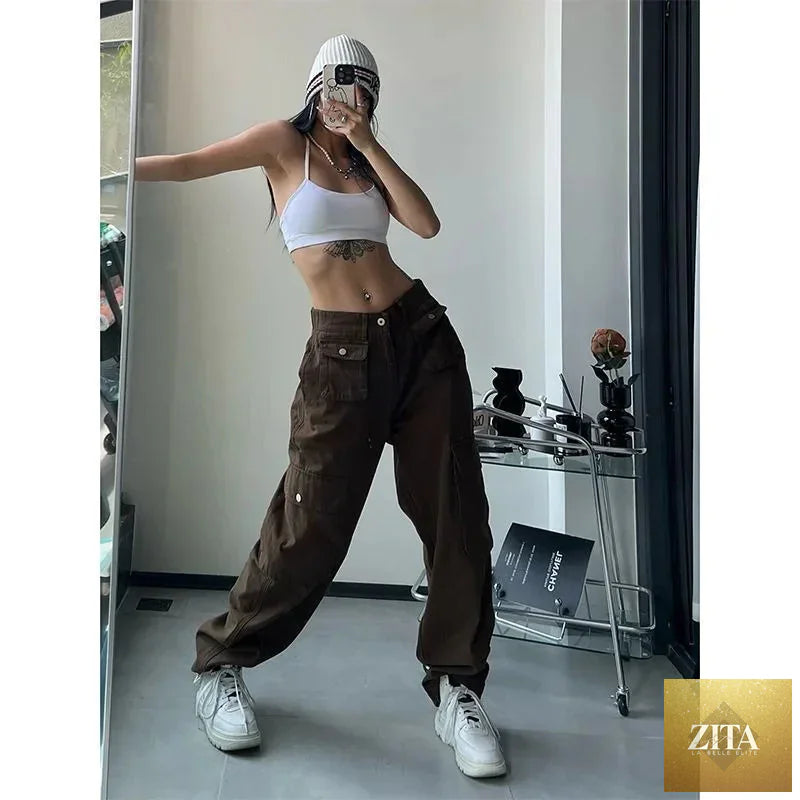 Women’s vintage cargo pants by SHOMICOBOUTIQUE featuring baggy fit, brown color, streetwear style, 90s aesthetic, casual and hippie look.