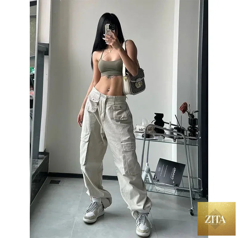 Women’s vintage cargo pants by SHOMICOBOUTIQUE featuring brown, baggy streetwear style with a 90s hippie-inspired aesthetic.
